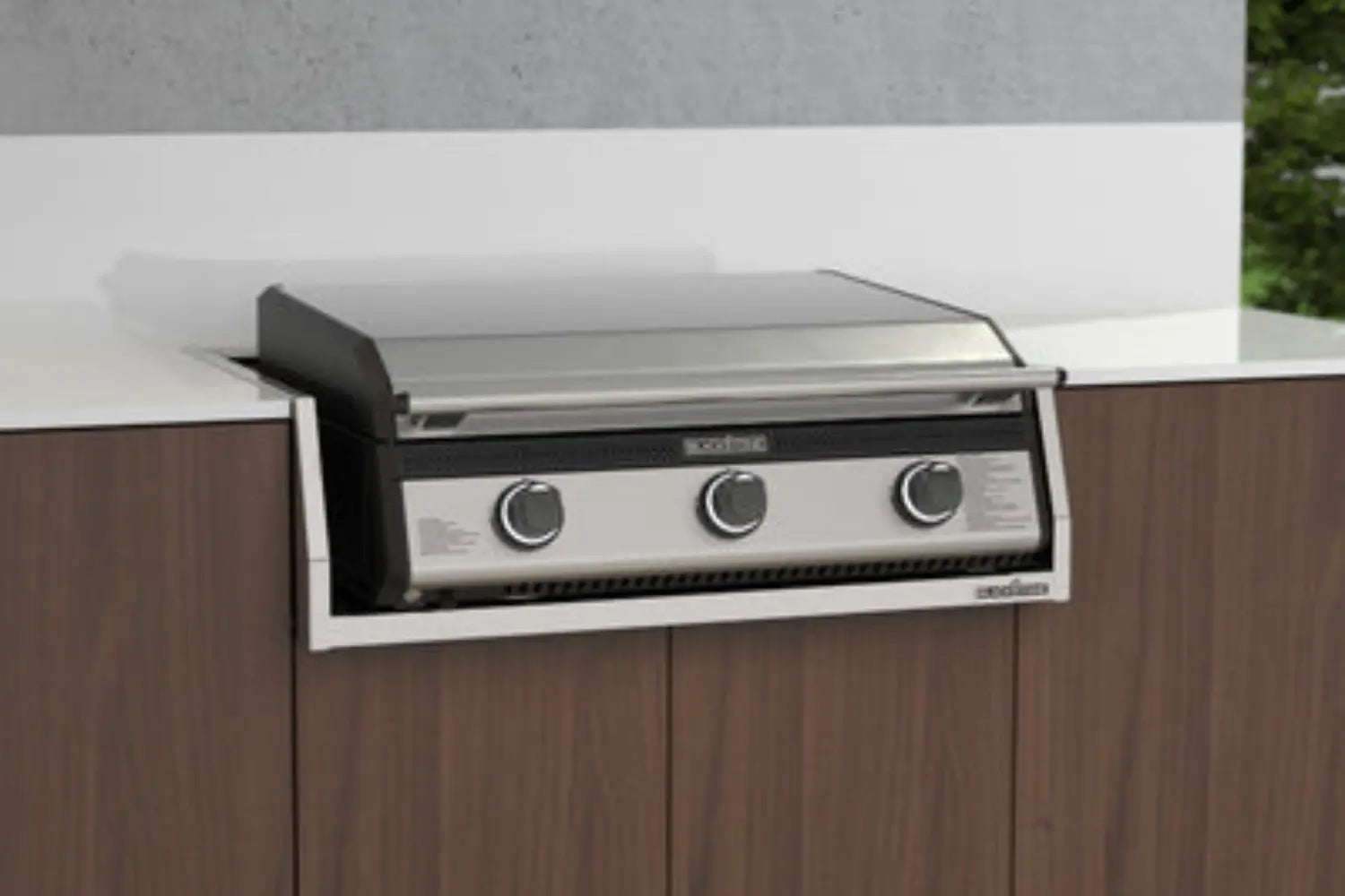 Outdoor gas griddle cooking burgers and vegetables on a patio